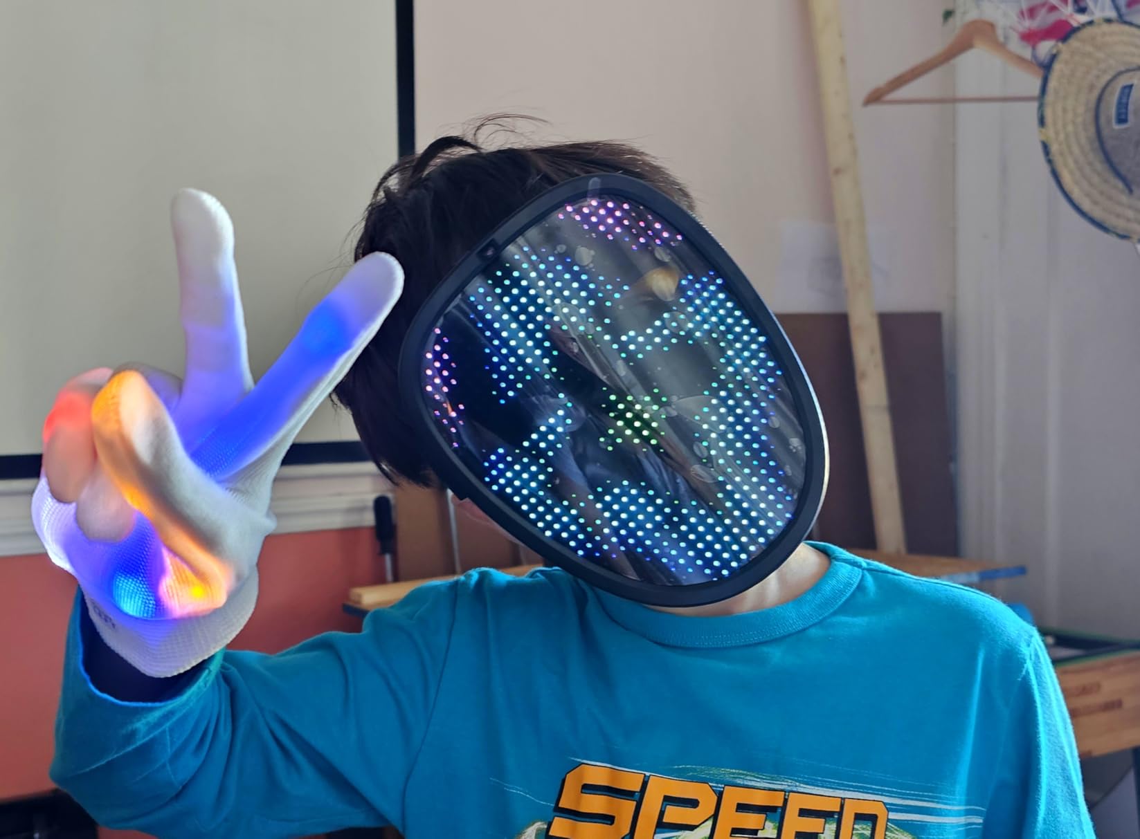 HauntedFinds LED Gesture Sensing Halloween Mask - 50 Color-Changing Faces, Glow in the Dark Skeleton Mask for Halloween Costume Parties