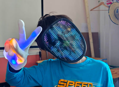 HauntedFinds LED Gesture Sensing Halloween Mask - 50 Color-Changing Faces, Glow in the Dark Skeleton Mask for Halloween Costume Parties
